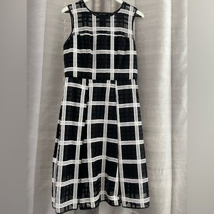 Beautiful black and white inverted pleat dress by Milly.